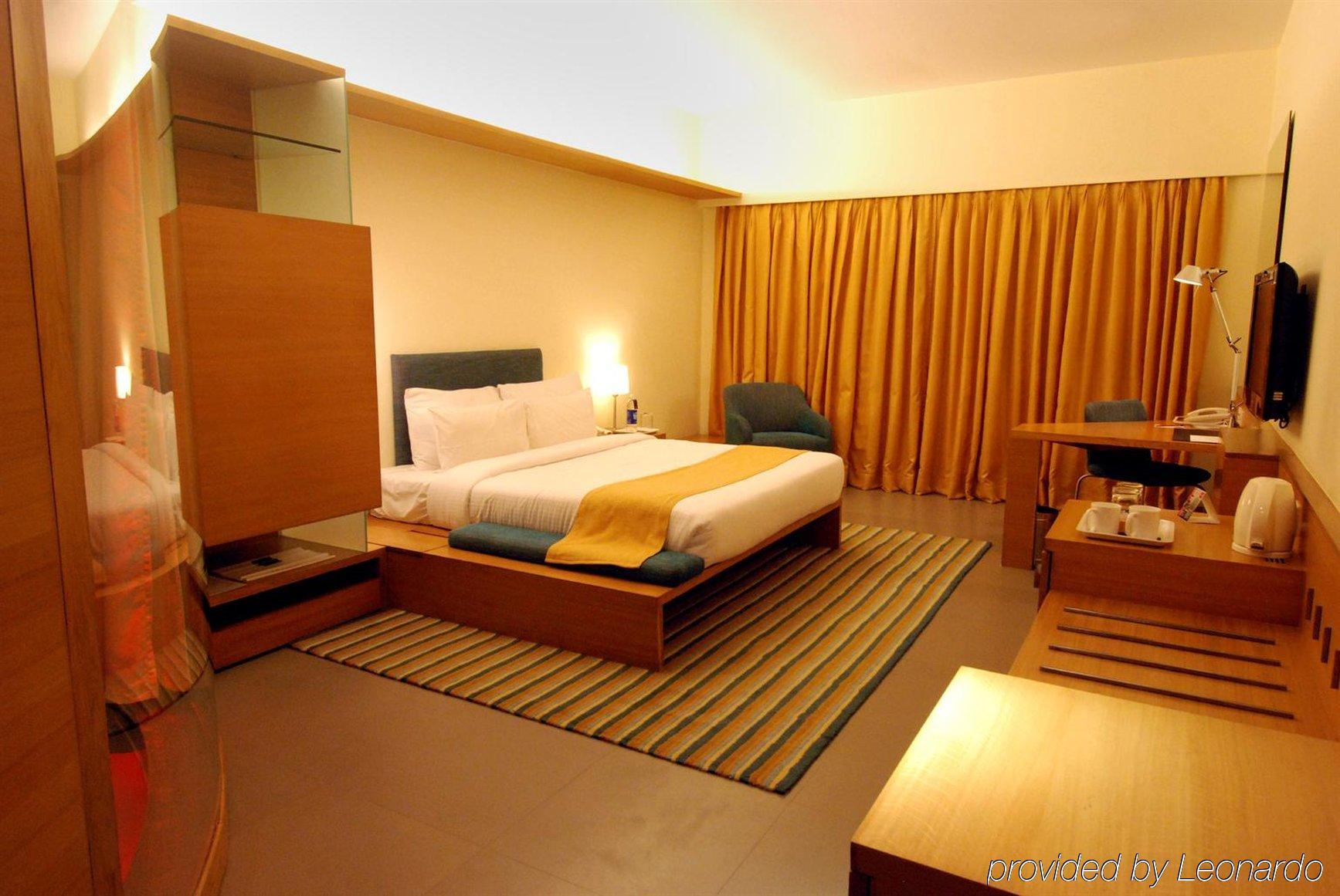 Hotel Parc Estique Pune Quarto foto